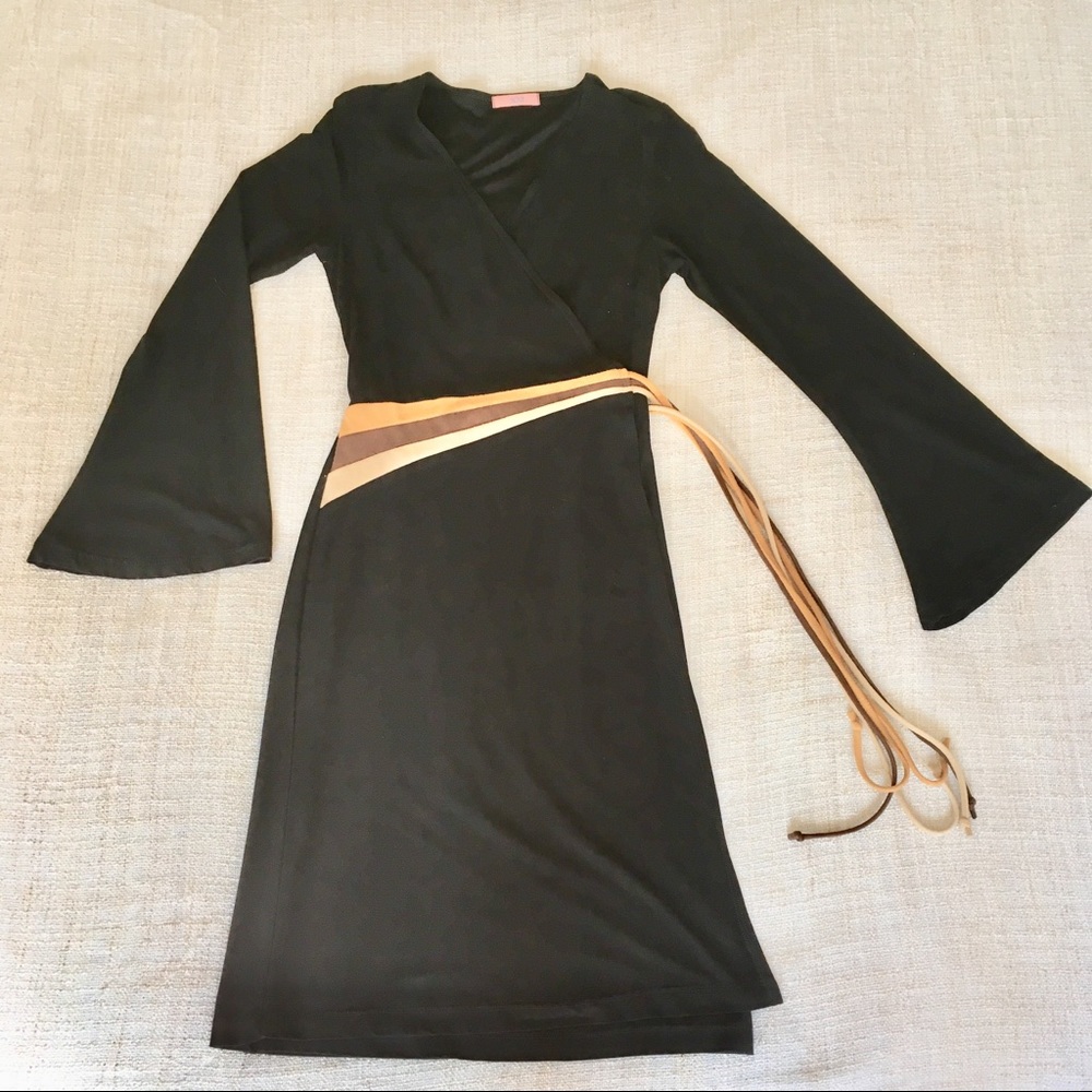 Long sleeve black wrap dress with bell sleeve.